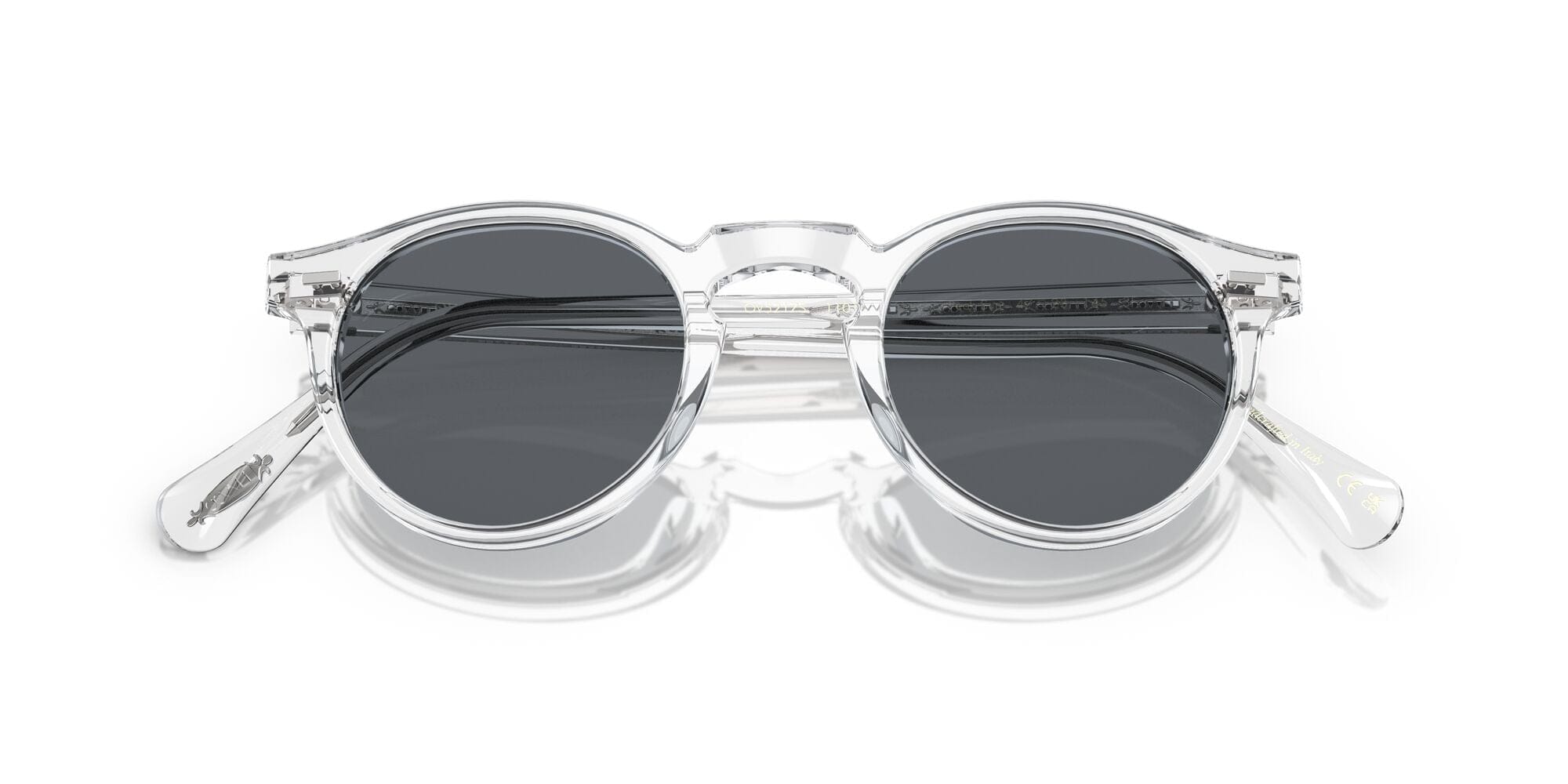 0OV5217S 1101R8 Gregory Peck size 50 crystal/blue photochromic lens